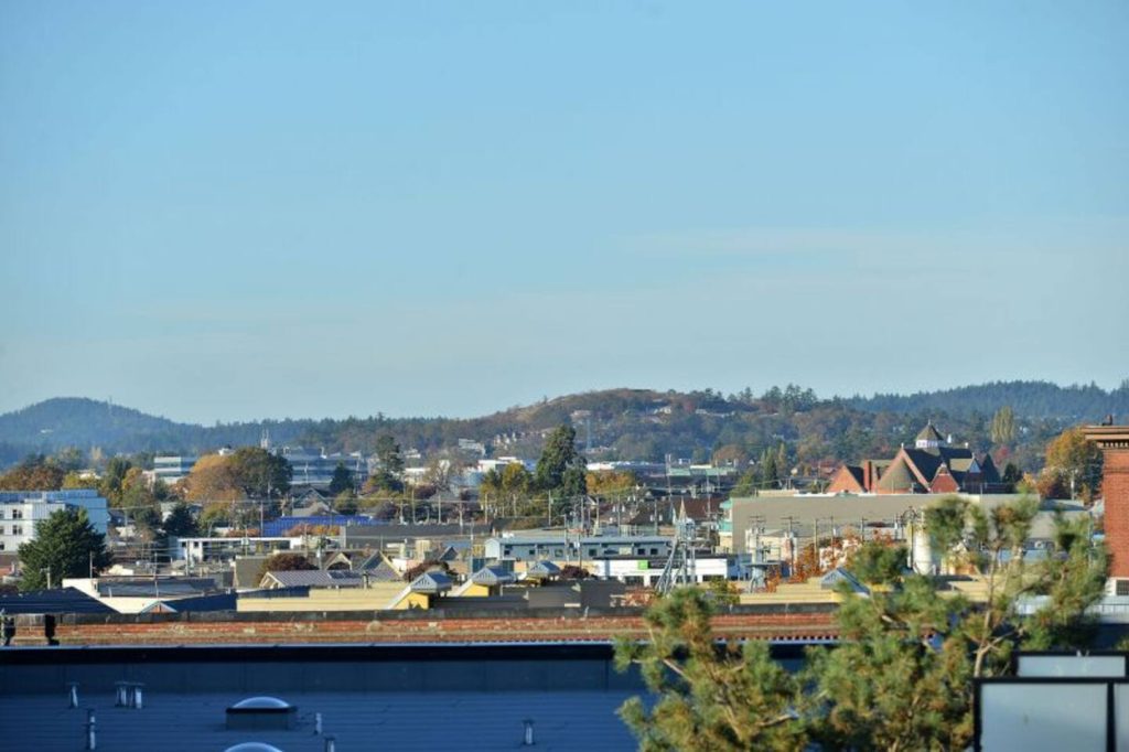 Enjoy the rolling hills of Victoria West, the sunset, & your urban landscape.