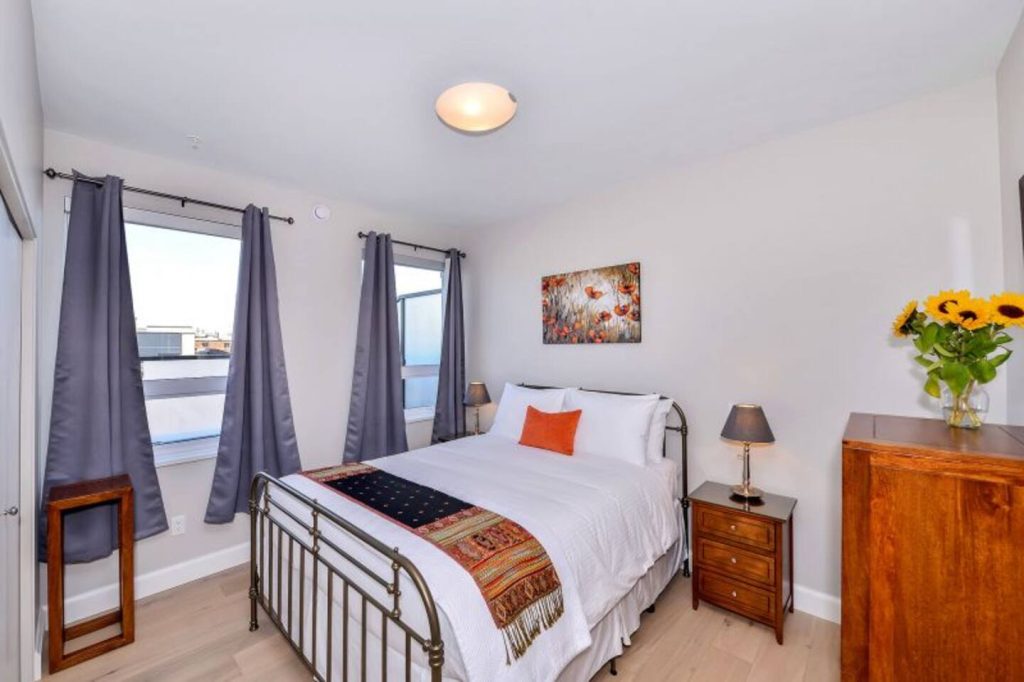 Master Bedroom with Queen Bed, chest of drawers large closet, privacy blinds & Blackout Drapes.