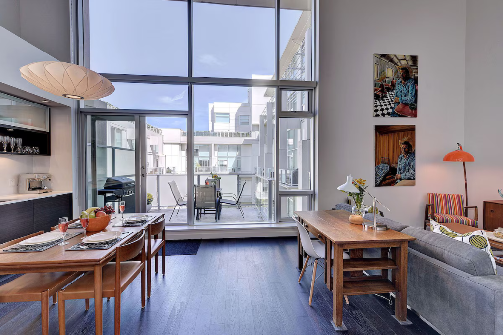 Floor to Ceiling Windows in this historic 2 bedroom 2 bath loft!